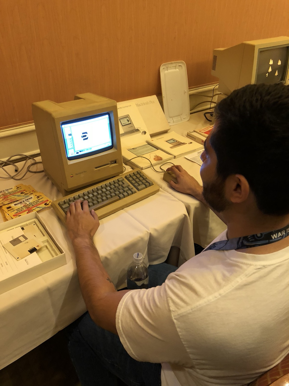 An engineer drawing the Bolted mark on a Macintosh Plus
